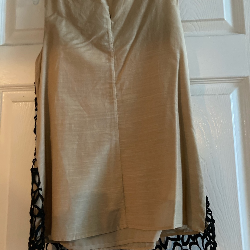 Top with nude color lining and black lace front.